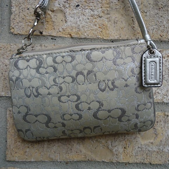 Coach wristlet with classic signature print canvas. - Picture 4 of 16